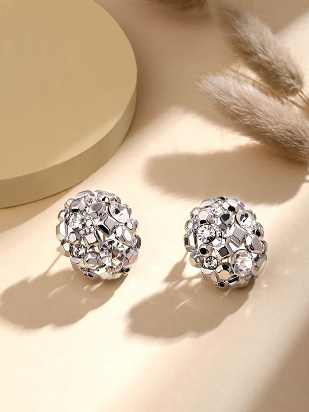 

Cierra Silver-Plated Crystals Circular Shaped Hoop Earrings