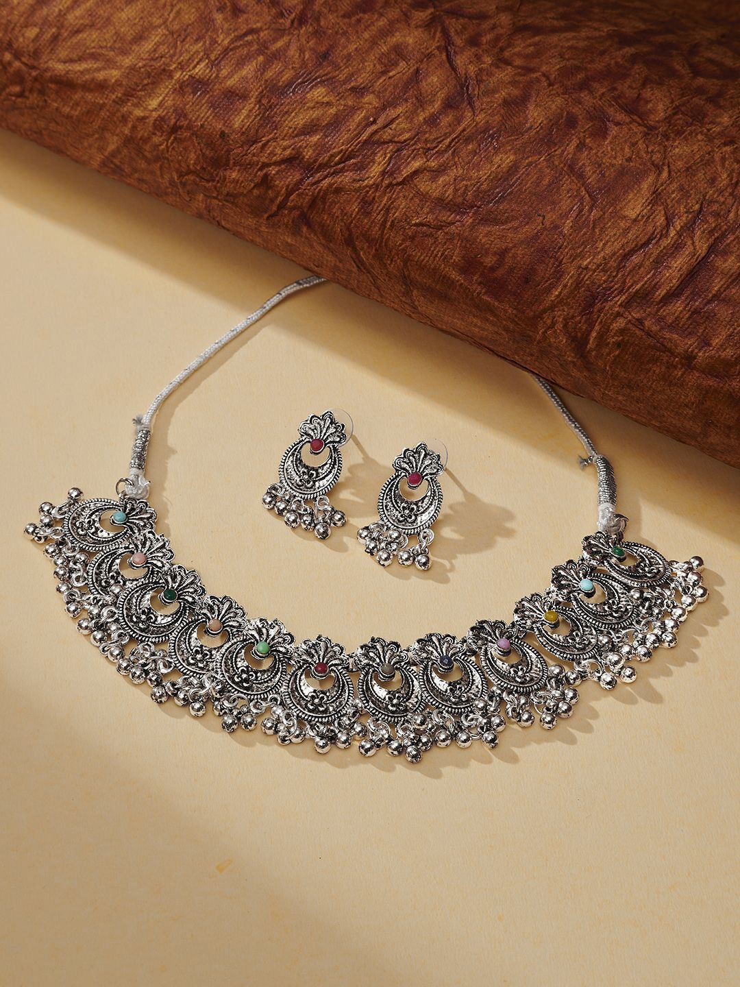 

TEEJH Women Silver-Plated Stone Studded Oxidised Jewellery Set