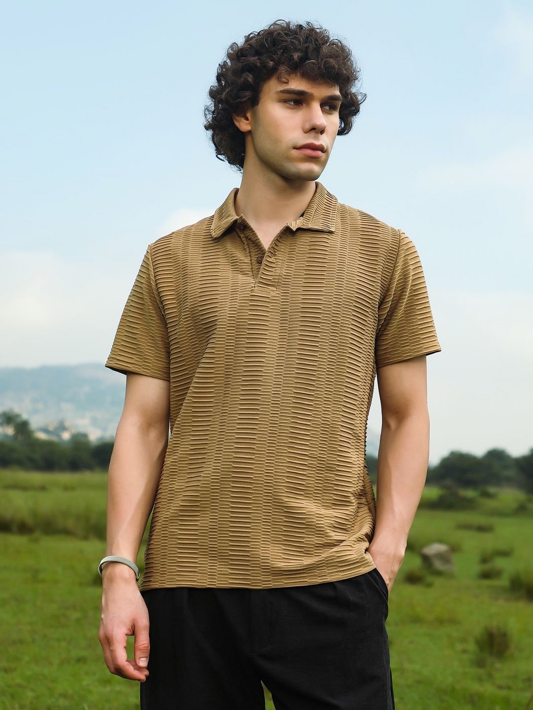 

Campus Sutra Men Self Design Polo Collar T-shirt, Brown