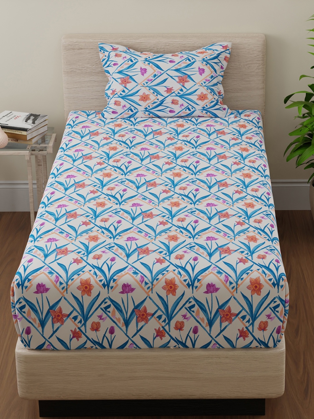 

Huesland Blue & Yellow Floral Printed 144 TC Cotton Single Bedsheet Set 2.23 m x 1.39 m