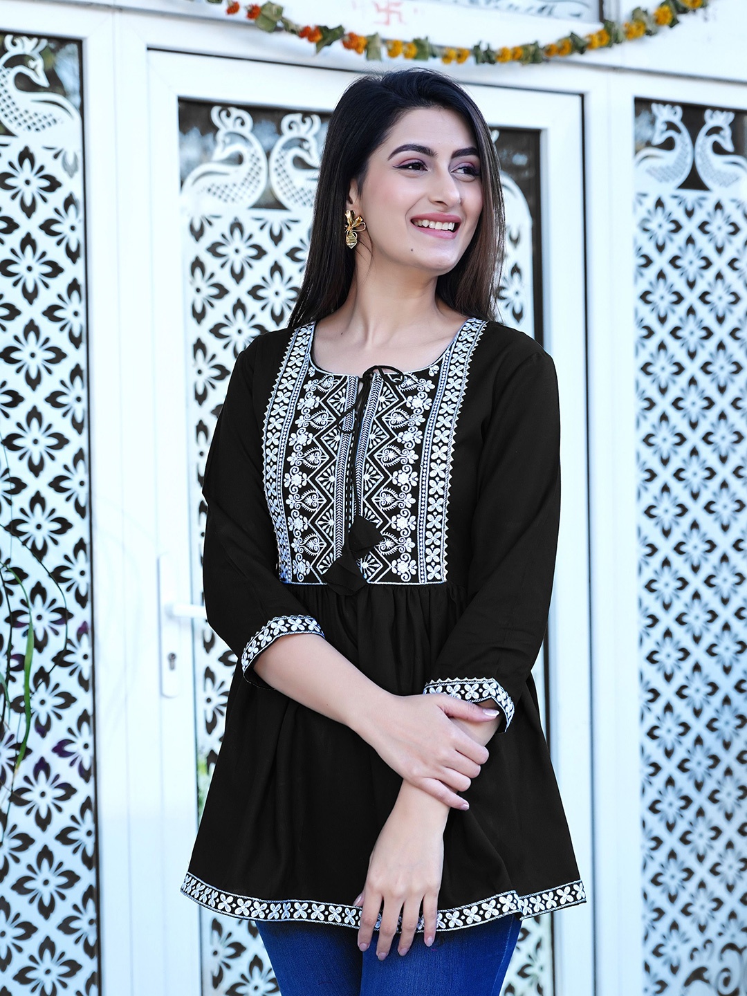 

SUBHLAXMI FASHION Women Embroidered Tie-Up Neck Empire Cotton Top, Black