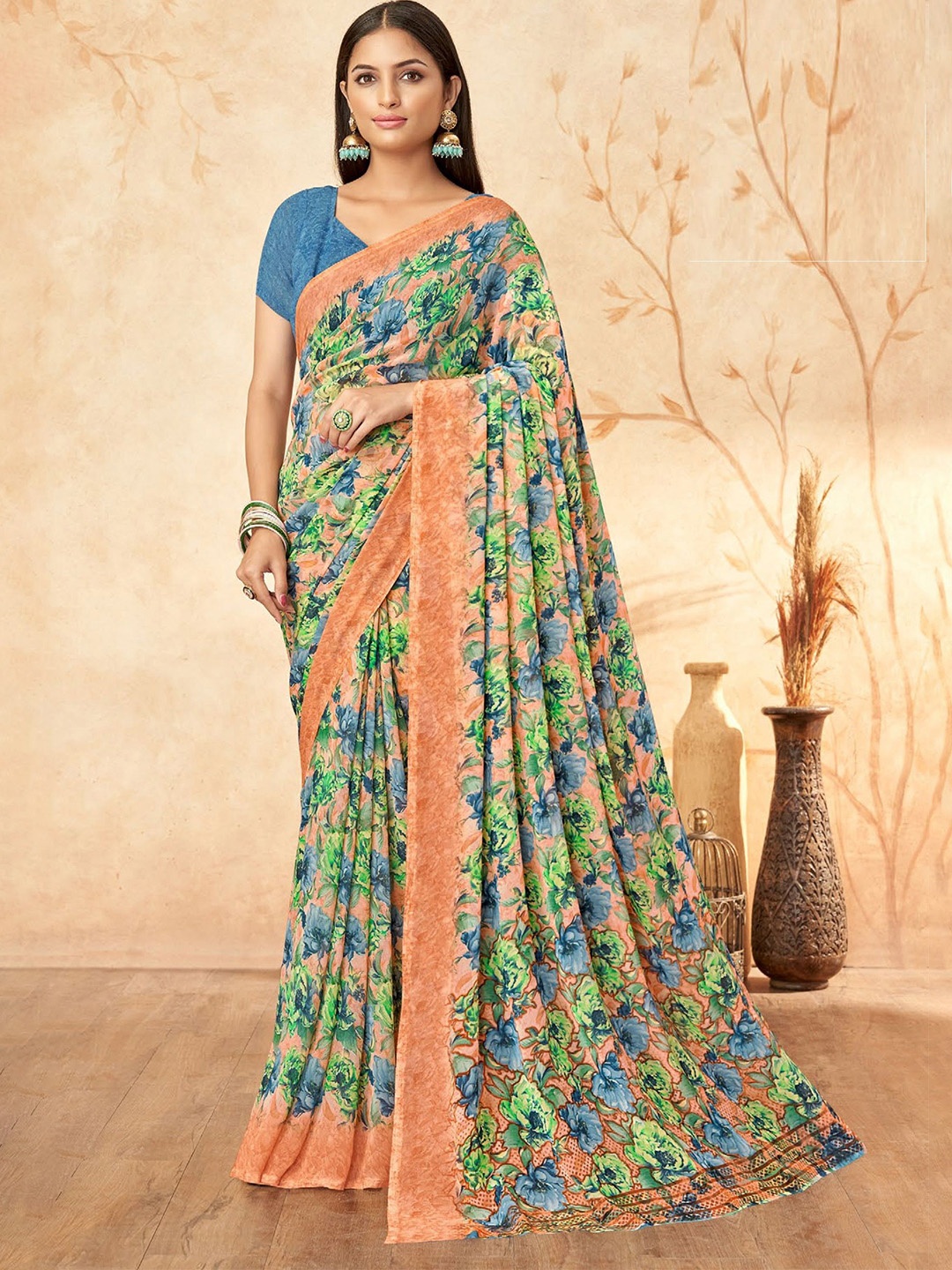 

Reboot Fashions Floral Printed Pure Georgette Saree, Peach