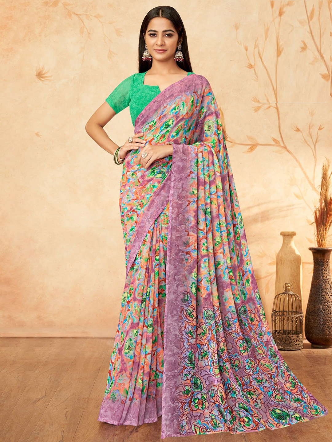 

Reboot Fashions Floral Printed Pure Georgette Saree, Mauve