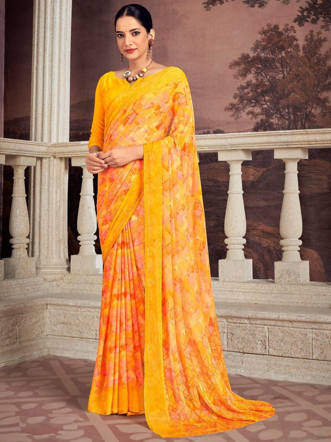 

Reboot Fashions Abstract Printed Pure Chiffon Saree, Mustard