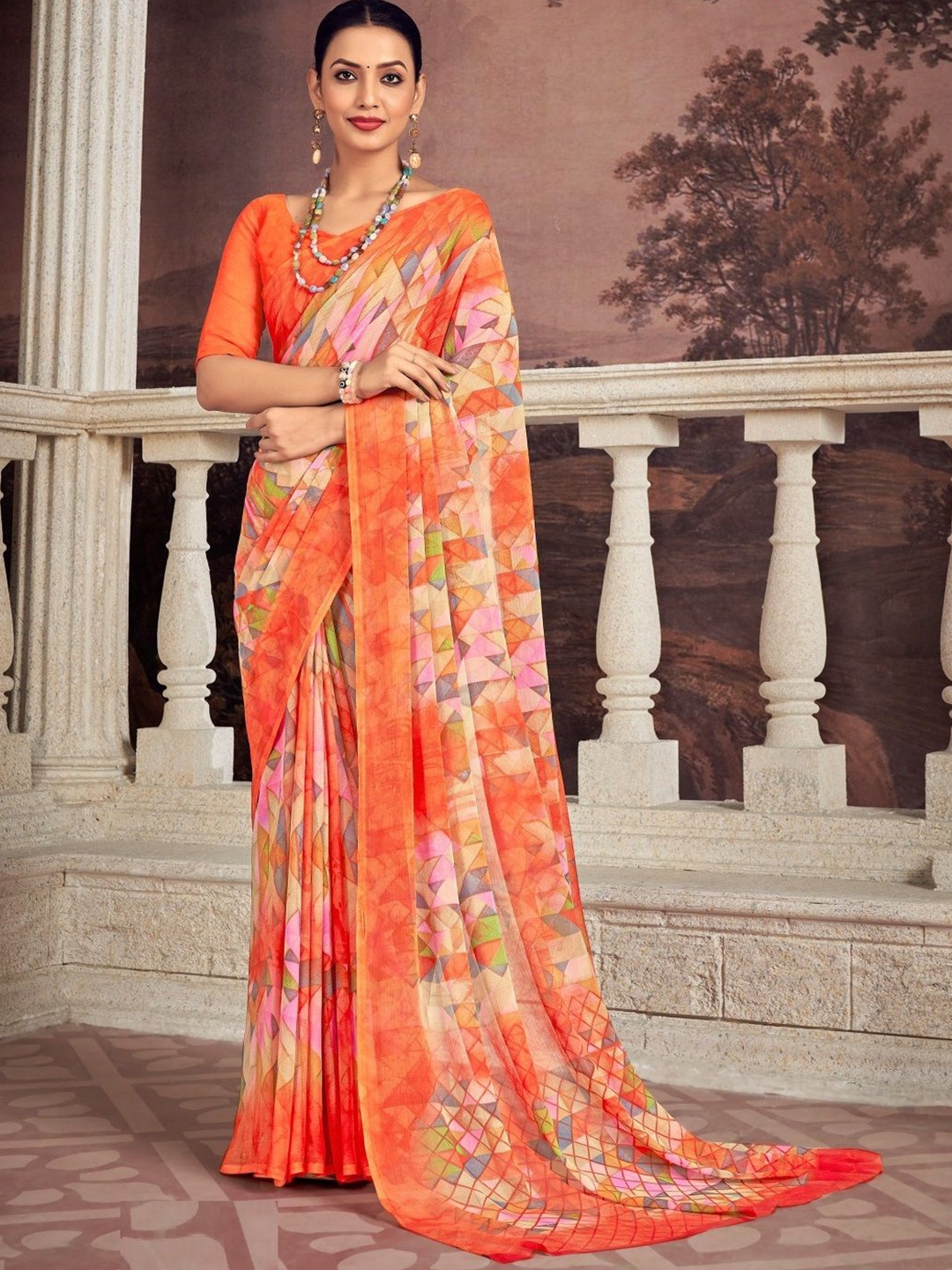 

Reboot Fashions Pure Chiffon Saree, Orange