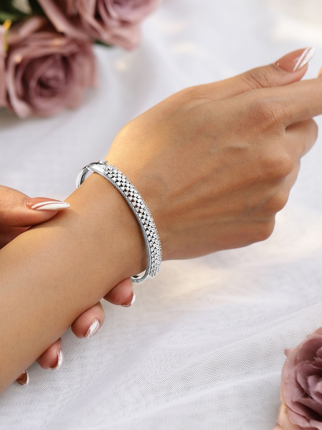 

Rubans Rhodium Plated Cubic Zirconia Bangles Style Bracelet, Silver