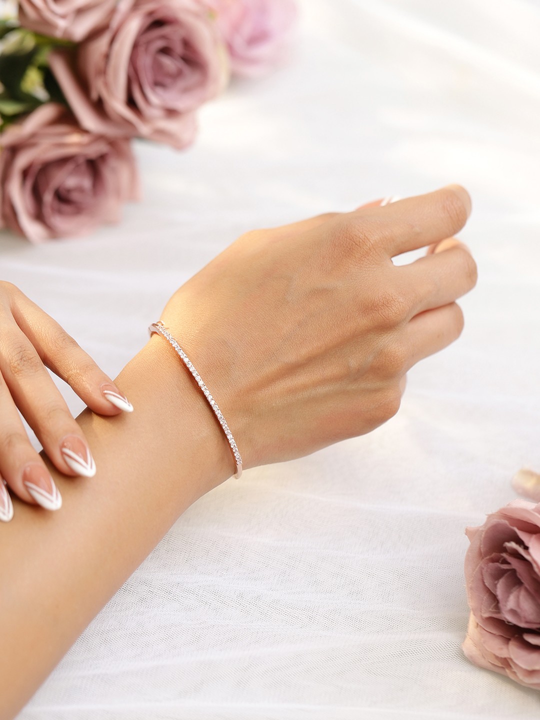 

Rubans Rose Gold Plated Cubic Zirconia Bangle Style Bracelet