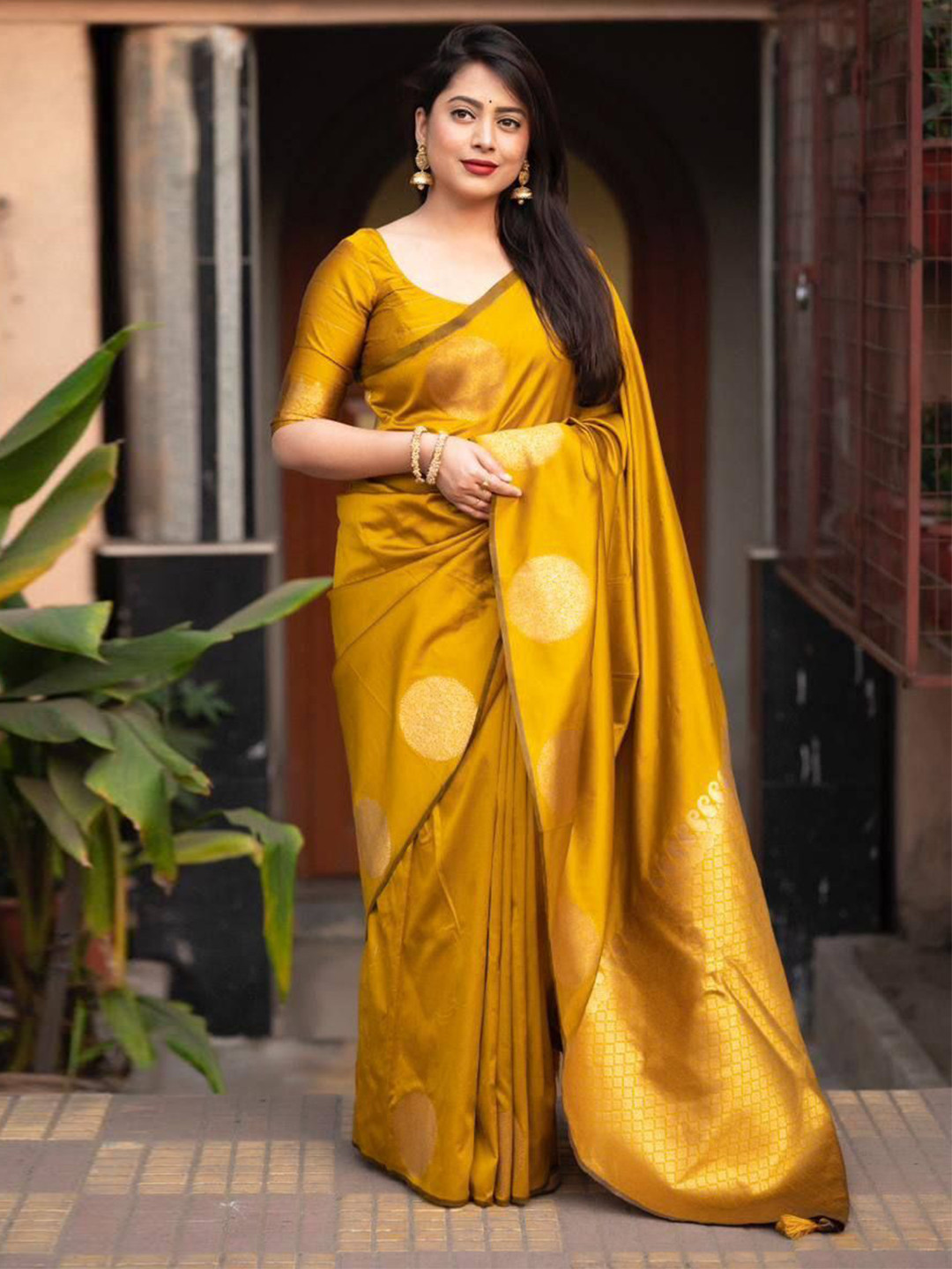 

Rujave Women Woven Design Zari Kanjeevaram Saree, Yellow