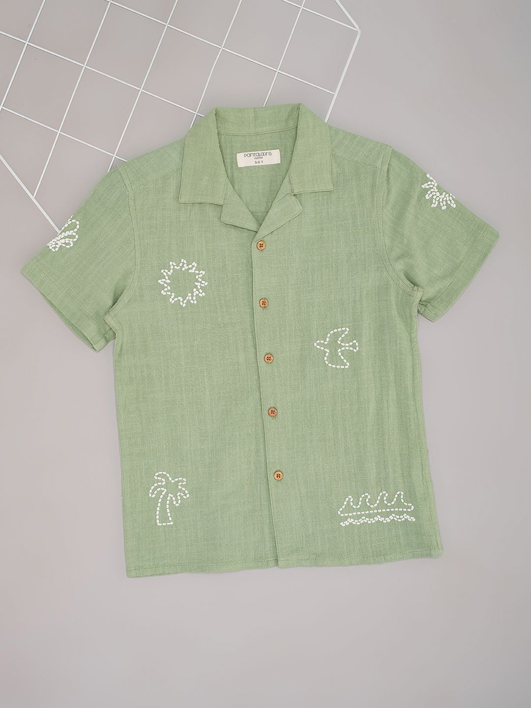 

Pantaloons Junior Boys Cuban Collar Graphic Printed Cotton Casual Shirt, Olive