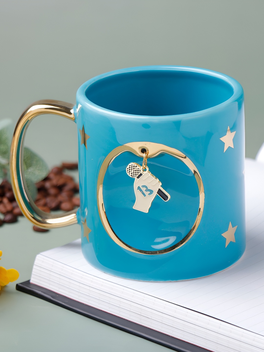 

Archies Blue & Gold-Toned Printed Ceramic Matte Voice Mic Ceramic Coffee Mug