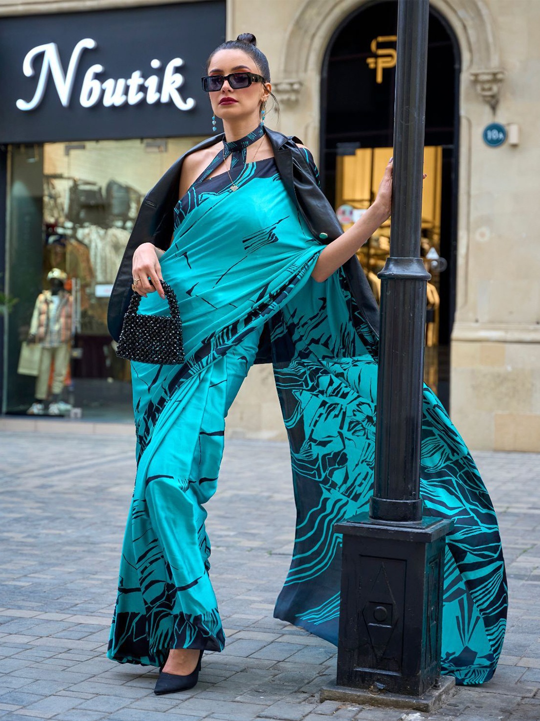 

ODETTE Blue Satin Printed Saree With Unstitched Blouse for Women