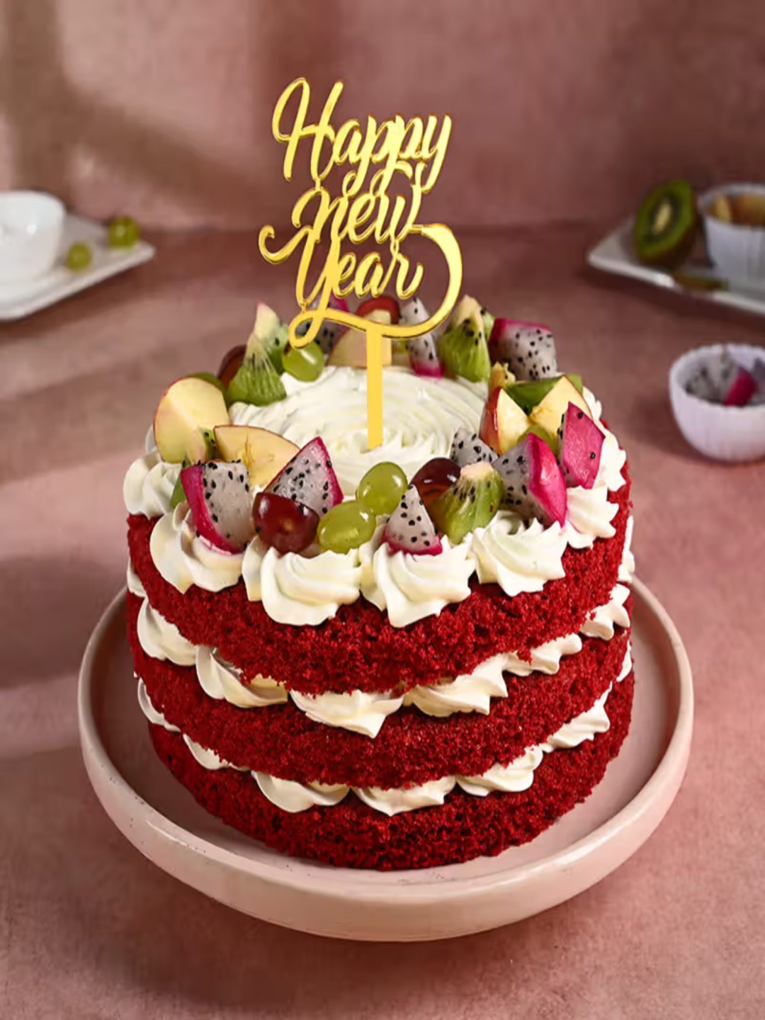 

Floweraura New Year Fruity Red Velvet Flavour Eggless Round Cake With Topper 2Kg