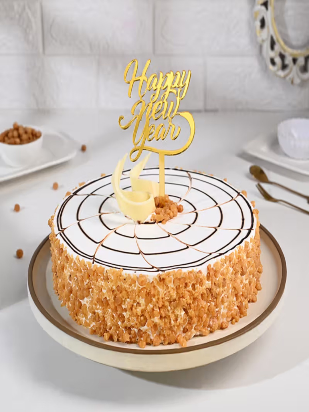 

Floweraura New Year Crunchy Butterscotch Flavour Eggless Round Cake 1Kg, White