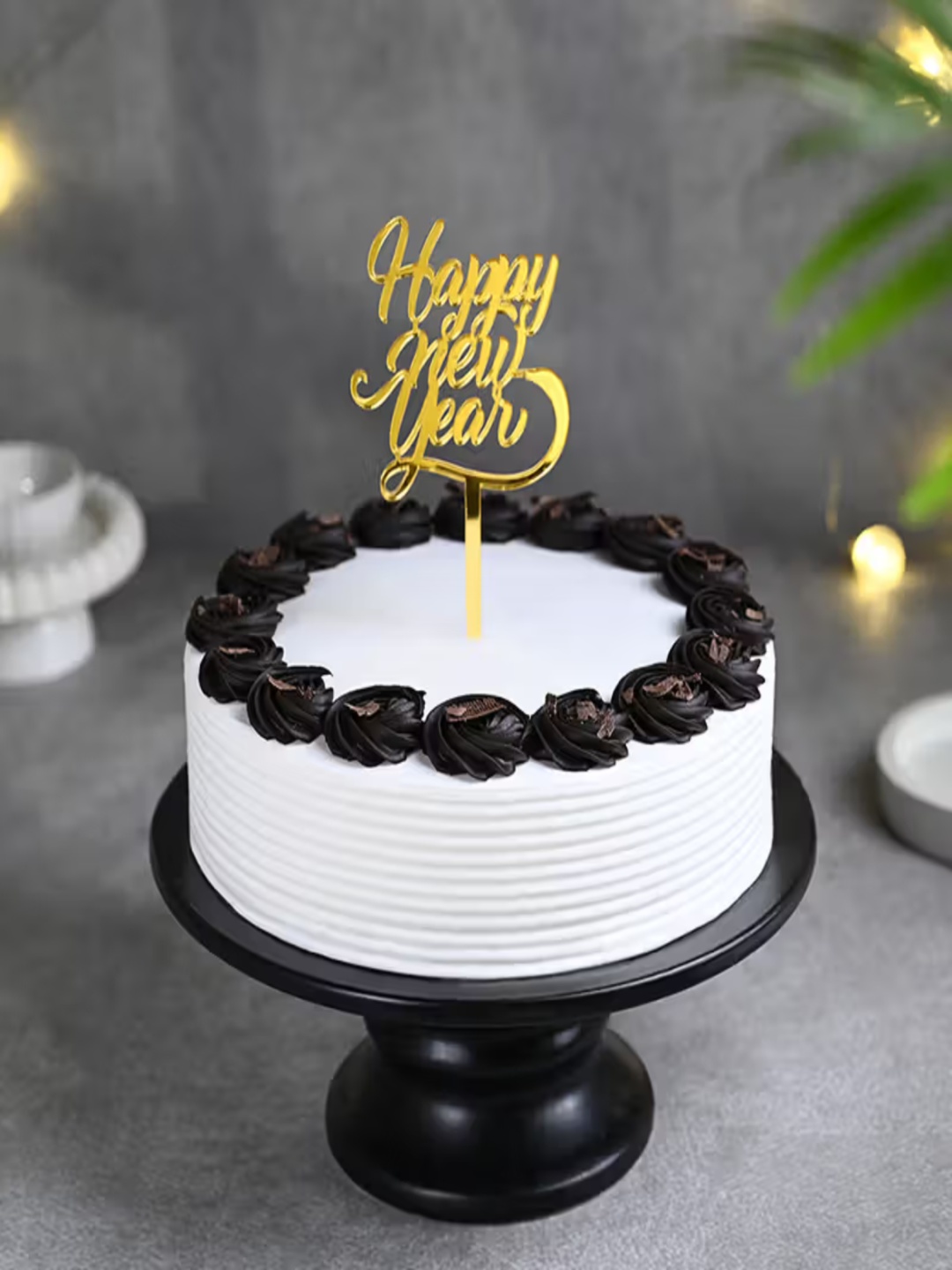 

Floweraura New Year Black Forest Flavour Eggless Round Cake With Topper 4Kg, White