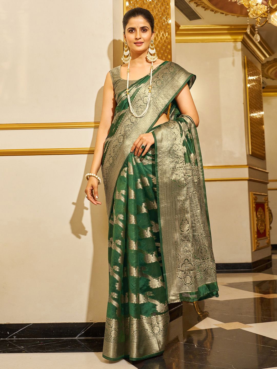 

KALINI Ethnic Motifs Woven Design Zari Organza Saree, Green