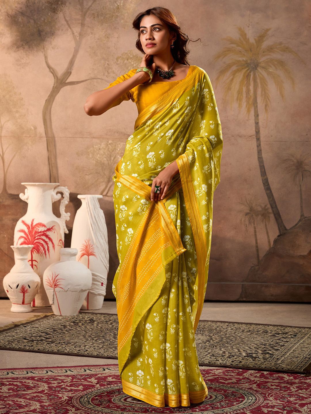 

Anouk Ethnic Motifs Printed Zari Saree, Olive