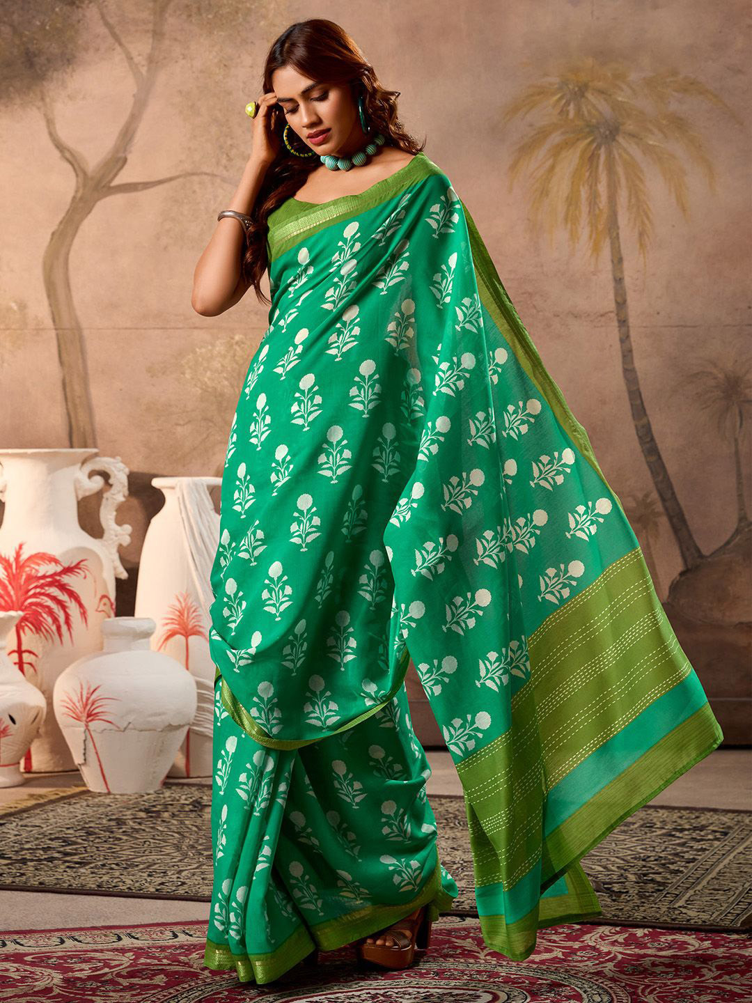 

Anouk Ethnic Motifs Printed Zari Saree, Green