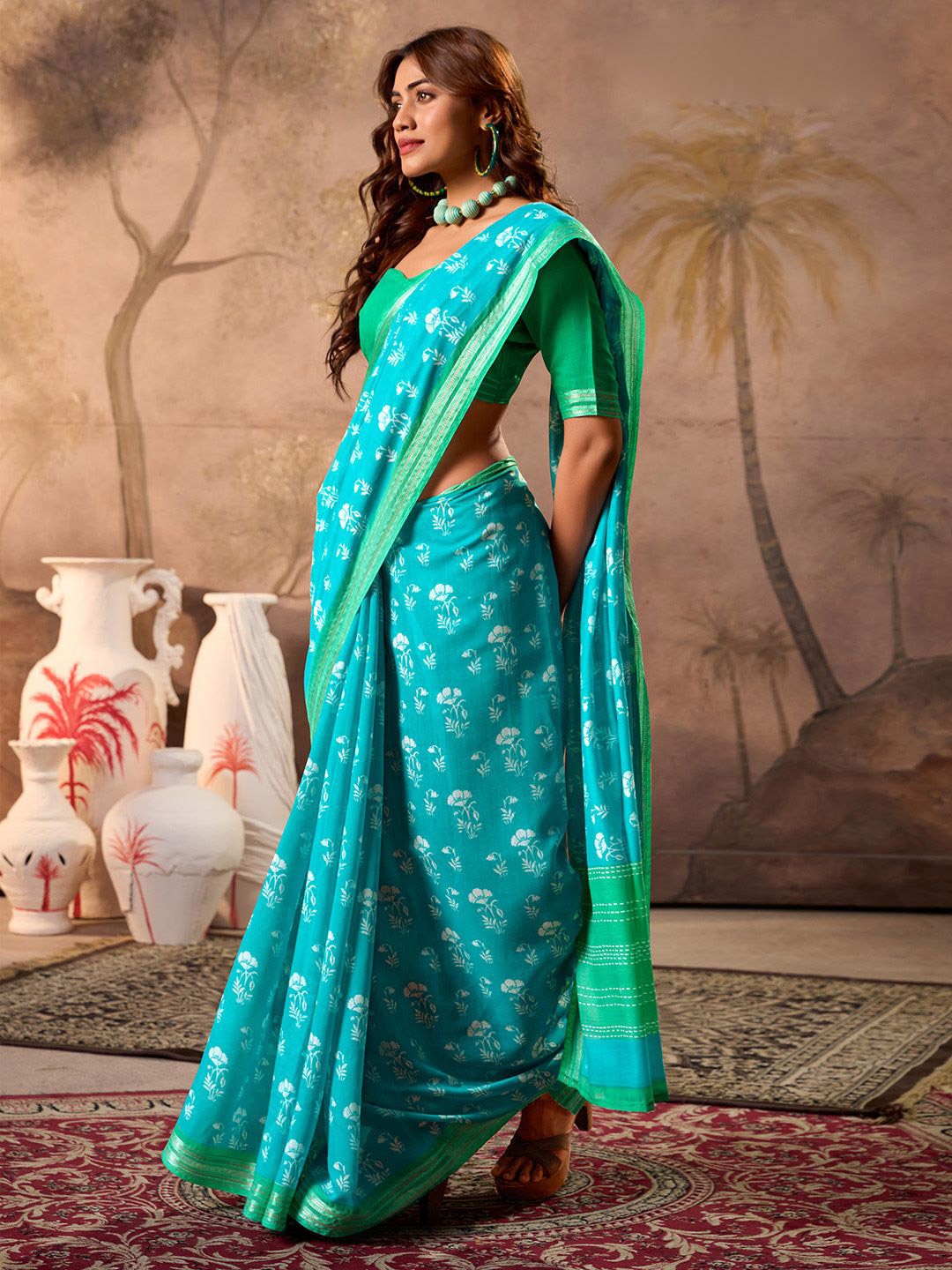 

Anouk Ethnic Motifs Printed Zari Saree, Turquoise blue