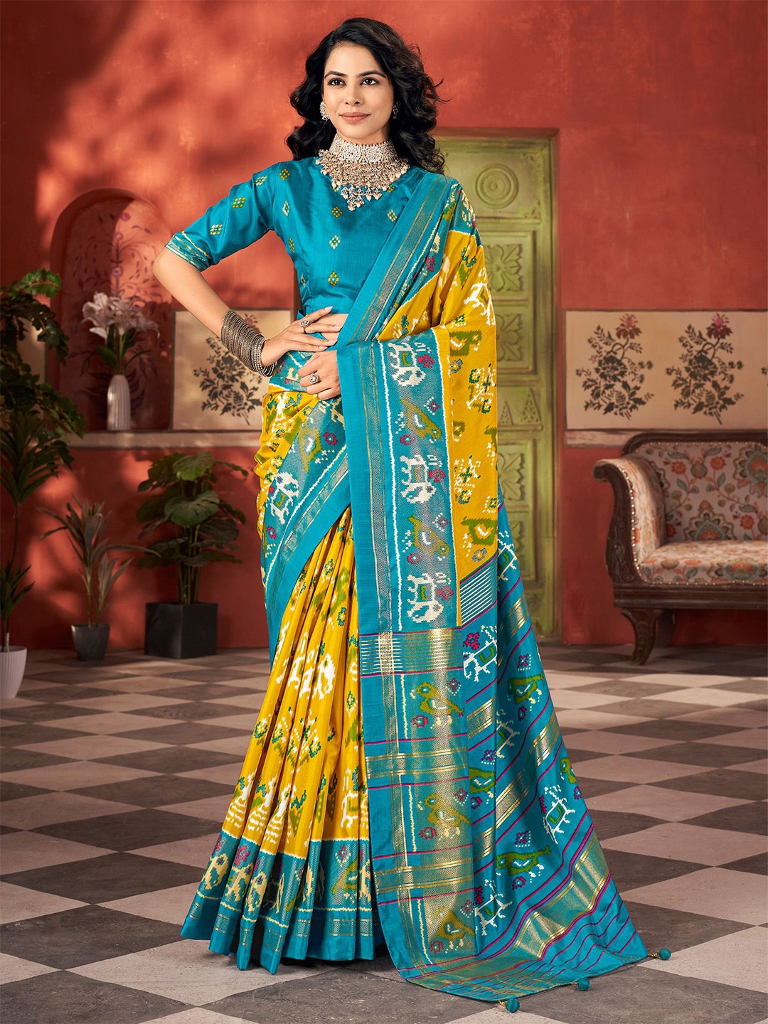 

Anouk Ethnic Motifs Woven Design Zari Patola Saree, Yellow