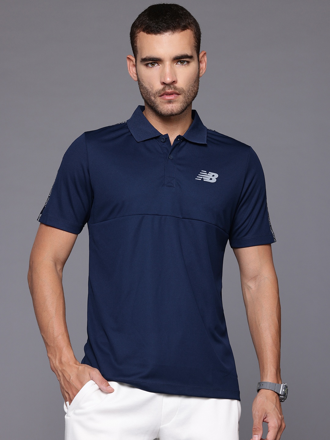

New Balance Typography Printed Polo Collar Slim Fit T-shirt, Navy blue