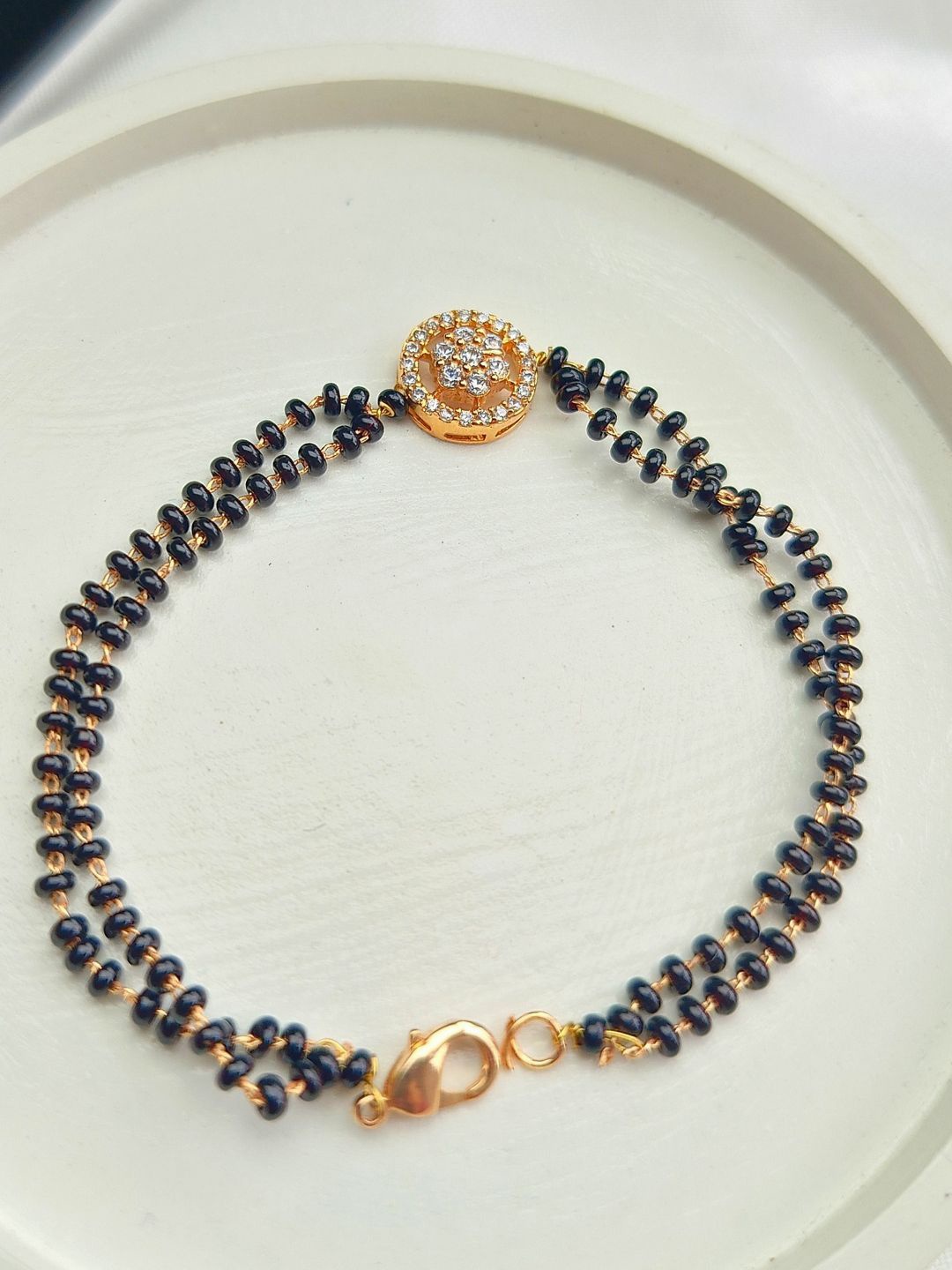 

Anouk American Diamond Rose Gold-Plated Stainless Steel Mangalsutra Bracelet, Black