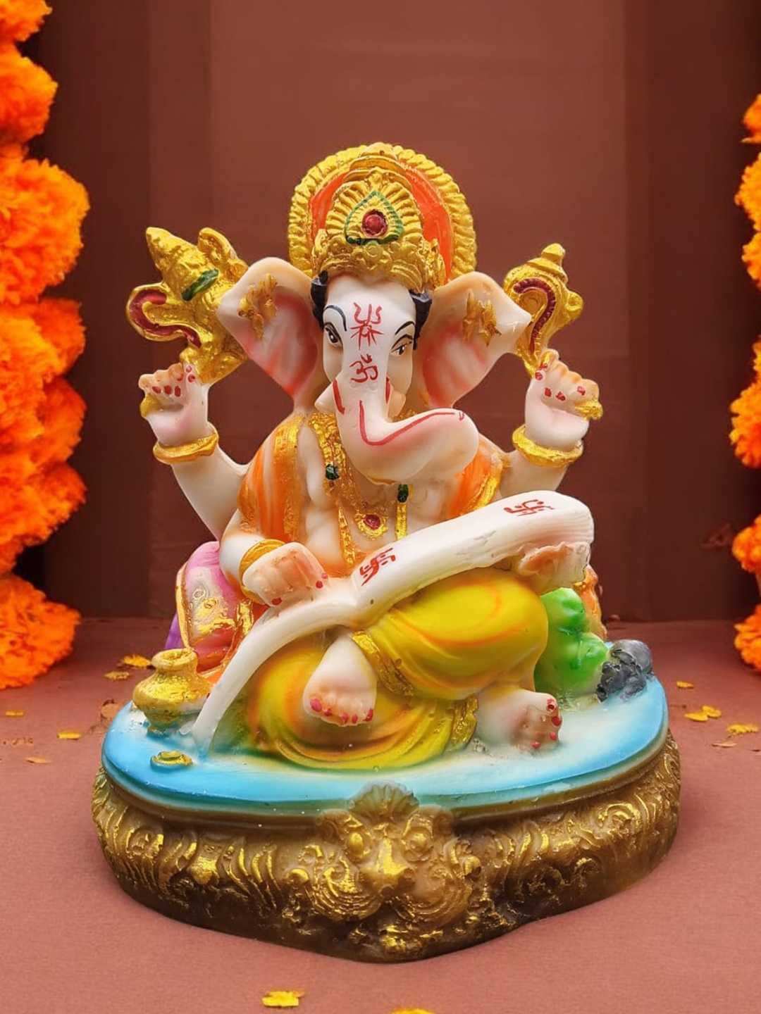 

NAYRA HANDICRAFTS Gold-Toned and Yellow Marble Ganesha Religious Idol Showpiece