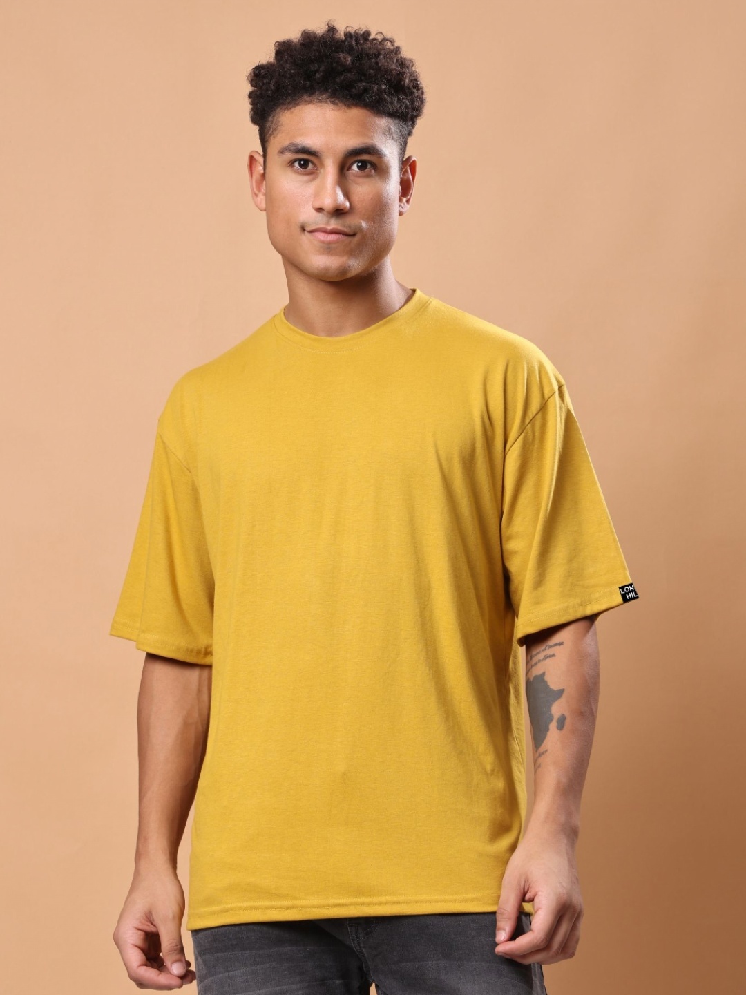 

London Hills Men Solid Round Neck Cotton Oversized T-shirt, Mustard
