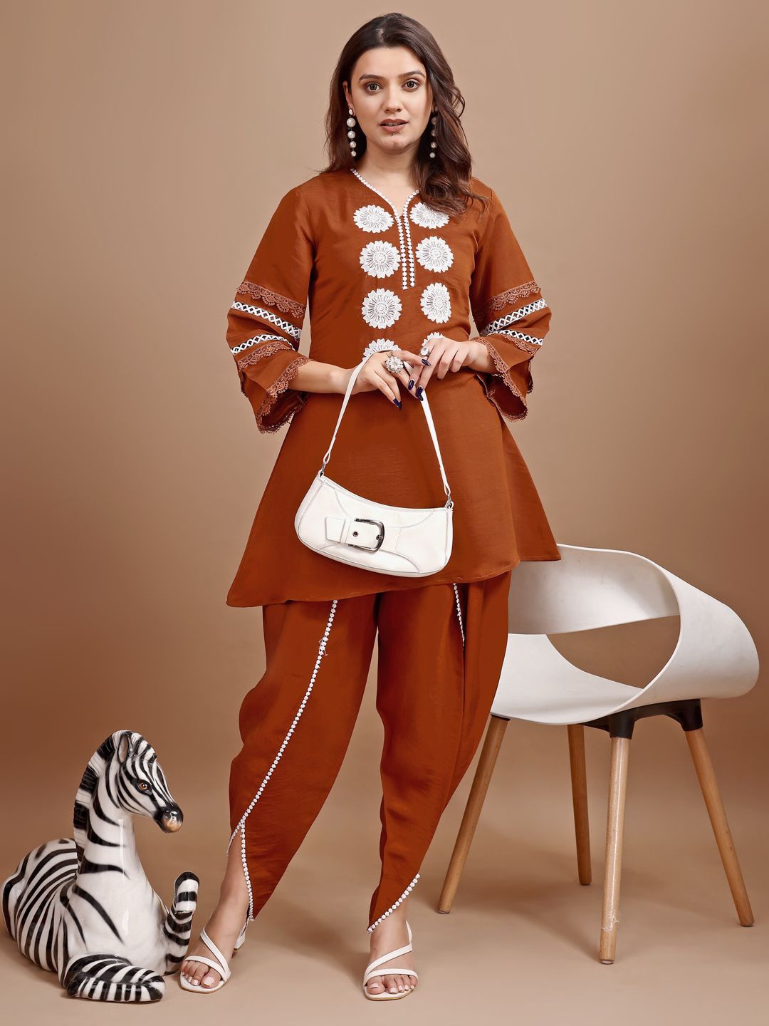 

Tikhi Imli Embroidered V-Neck Three-Quarter Sleeves Tunic With Dhoti Pant, Rust