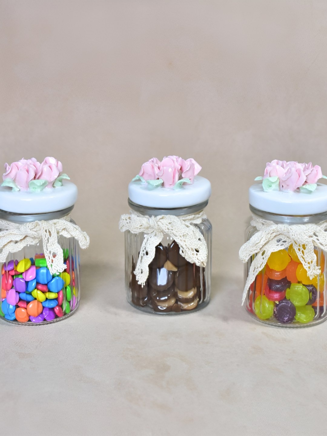 

THE HOME CO. Transparent & Blue 3 Pieces Ceramic Jar With Flower Lid