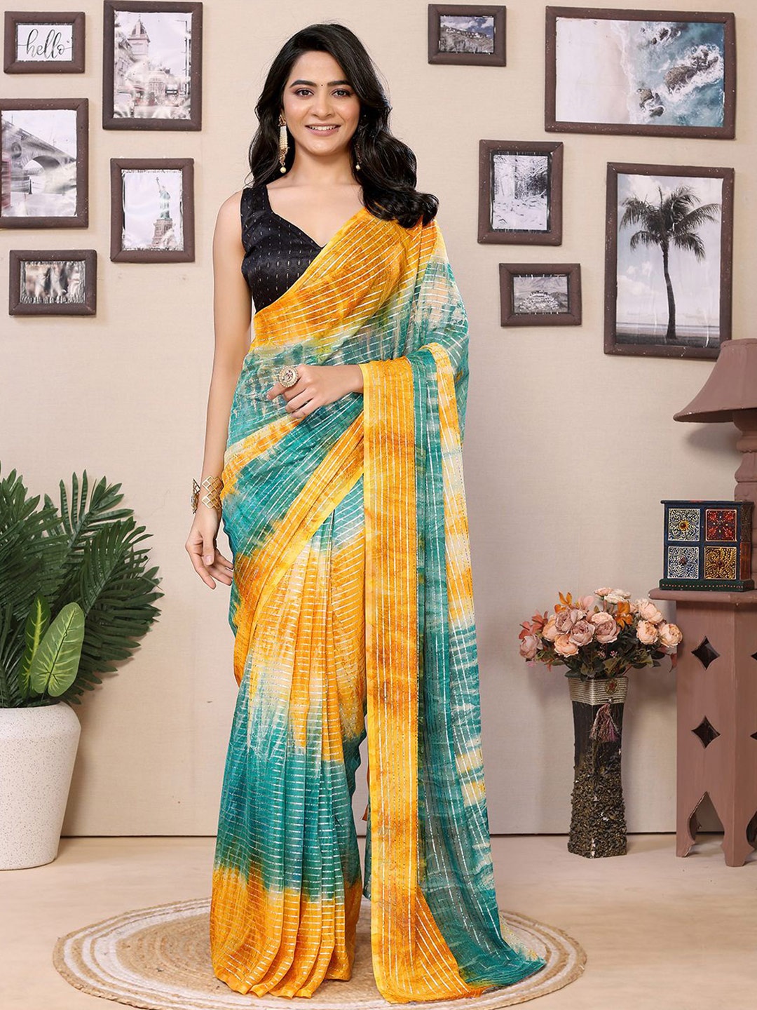 

Mitera Striped Ready to Wear Saree, Teal