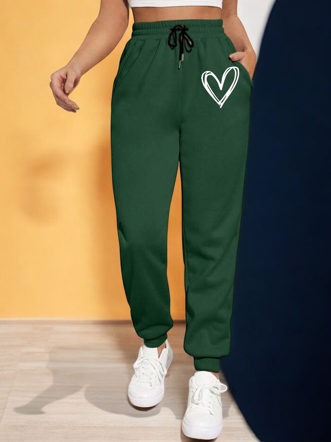 

SAAHASAM Women Printed Relaxed Joggers Trousers, Green