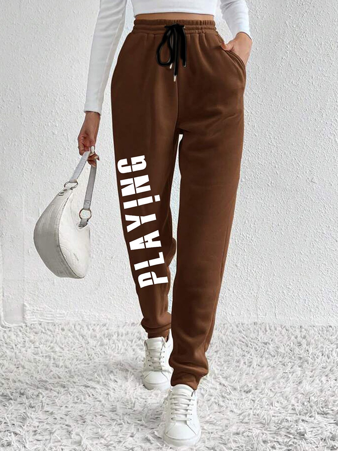 

SAAHASAM Women Printed Relaxed Joggers Trousers, Brown
