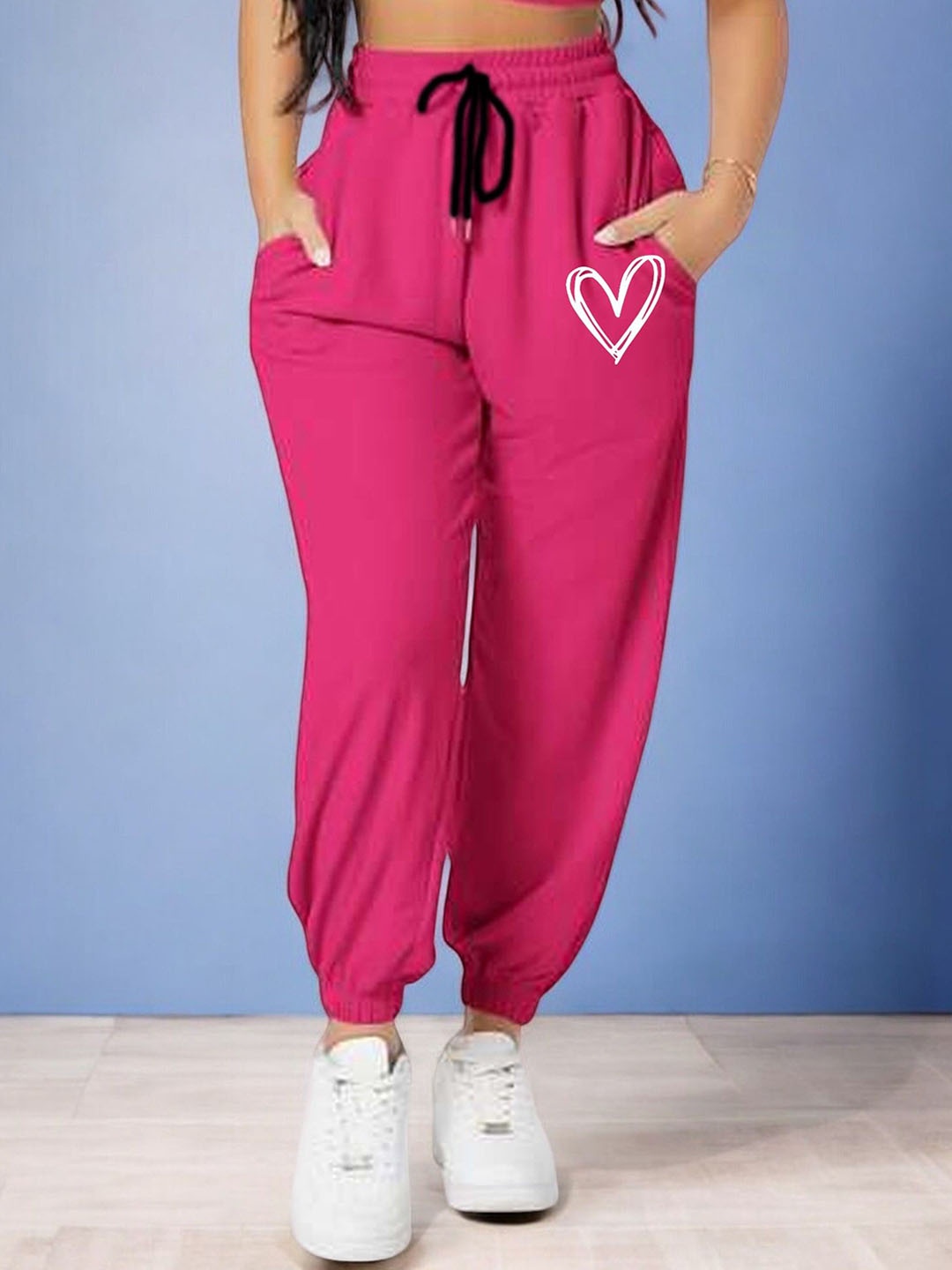 

SAAHASAM Women Printed Relaxed Fit Joggers Trousers, Pink
