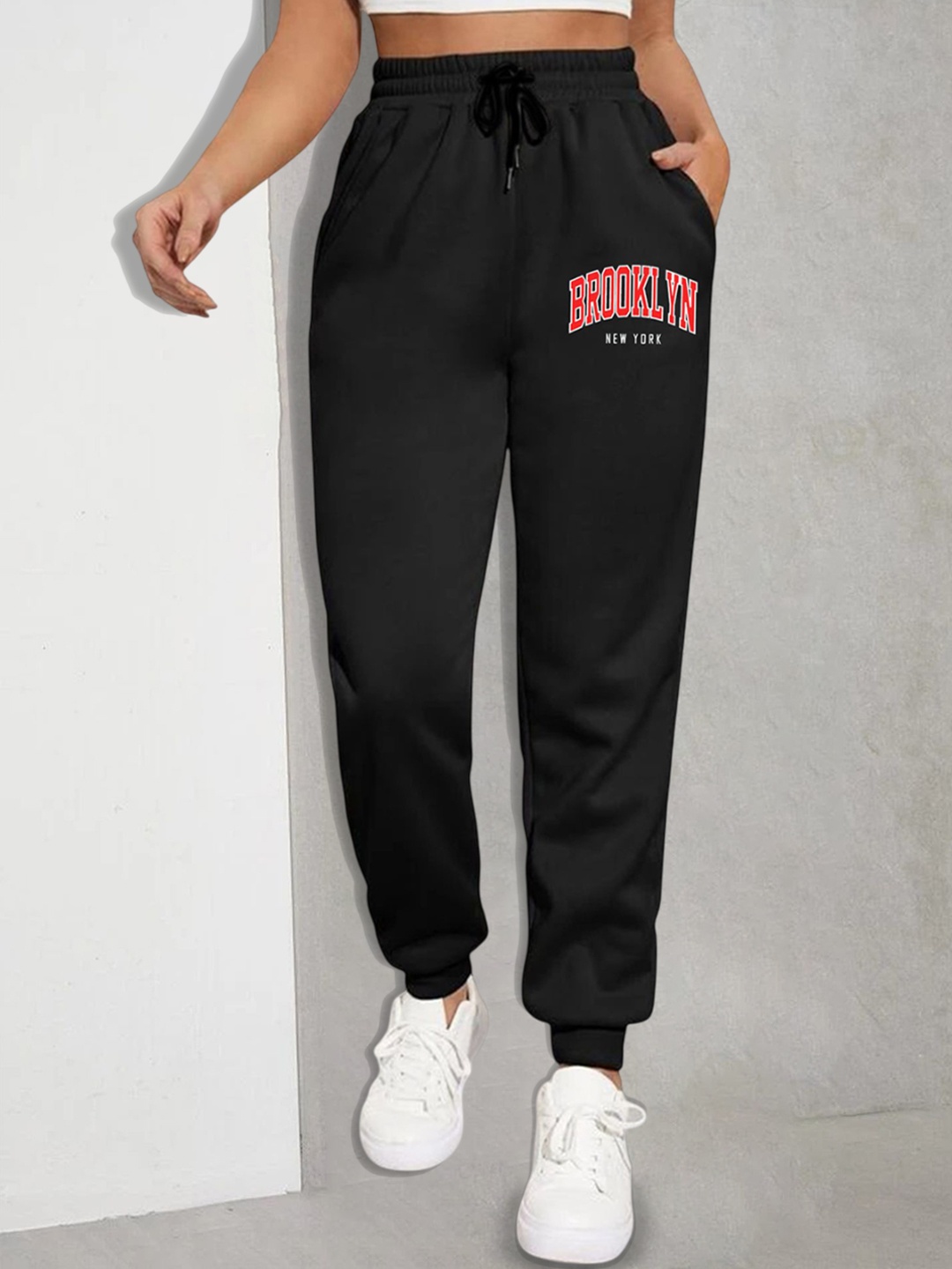 

SAAHASAM Women Printed Regular Fit Joggers, Black