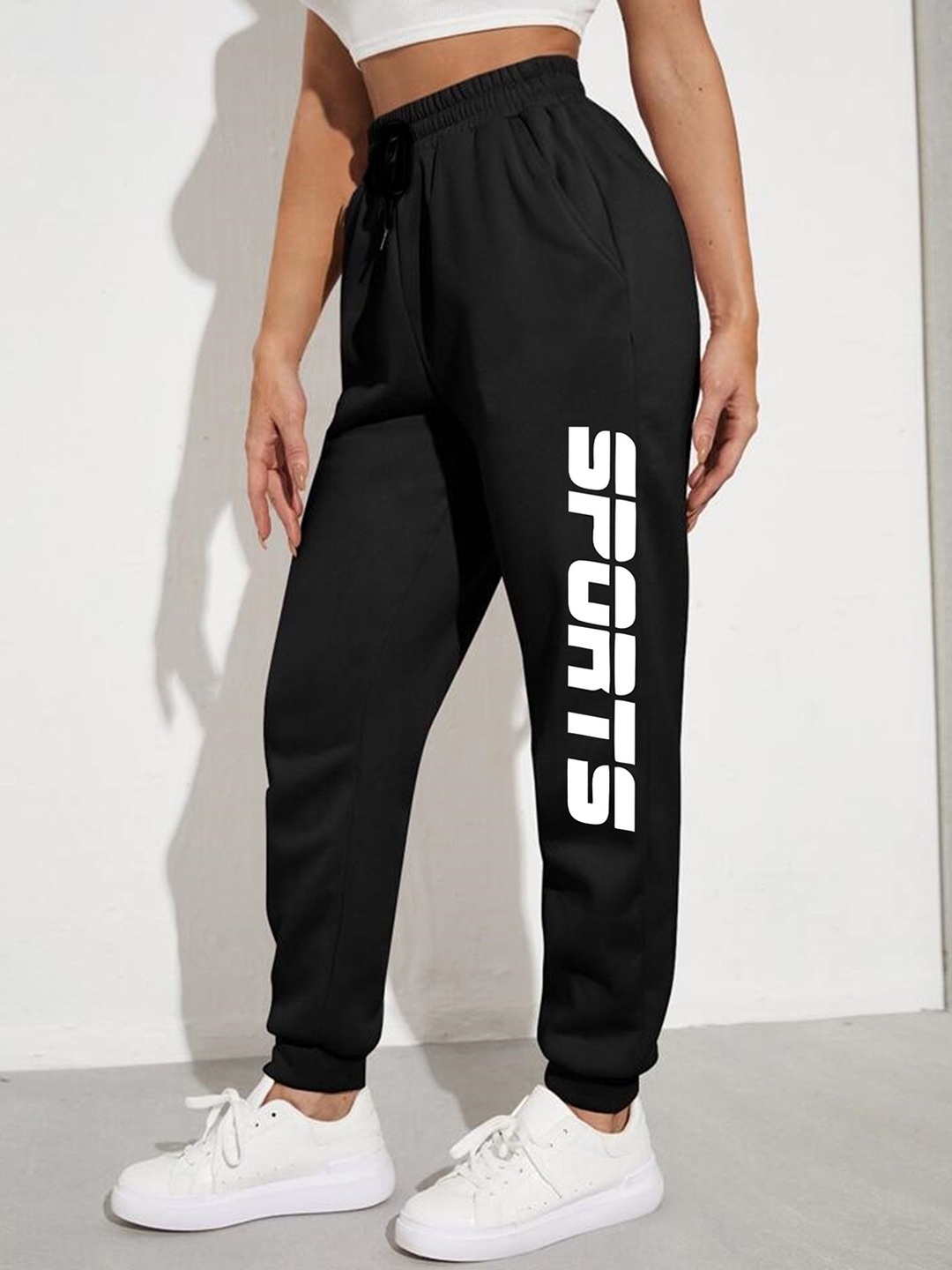 

SAAHASAM Women Printed Relaxed Regular Fit Joggers, Black
