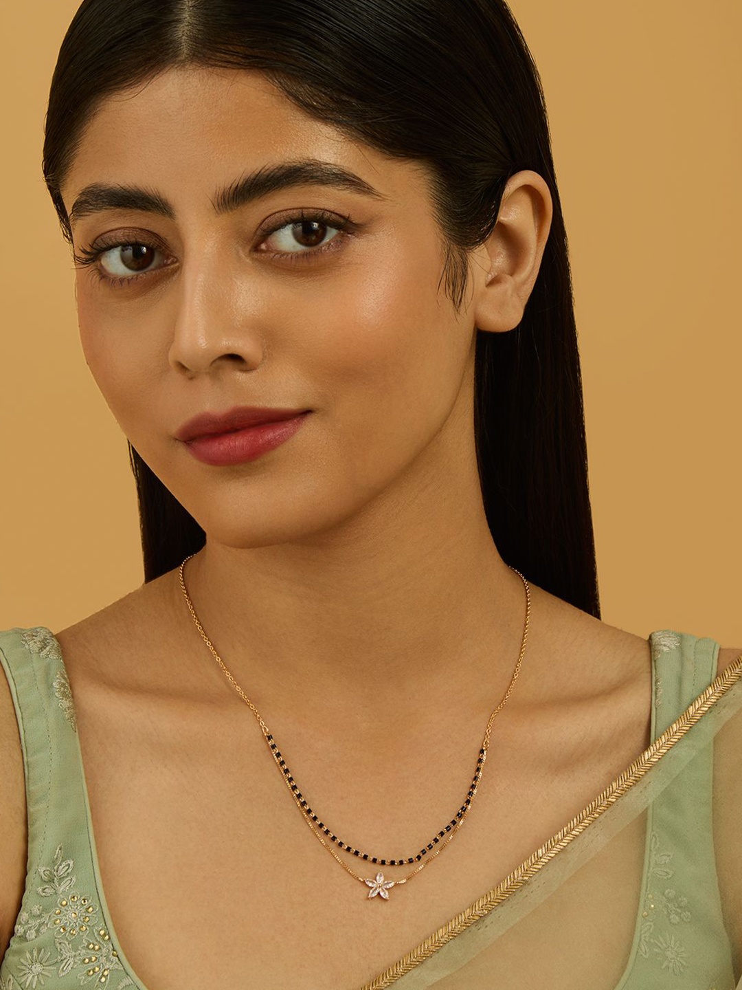 

Kushal's Fashion Jewellery Trendy Gold-Plated Stone Studded & Beaded Layered Mangalsutra