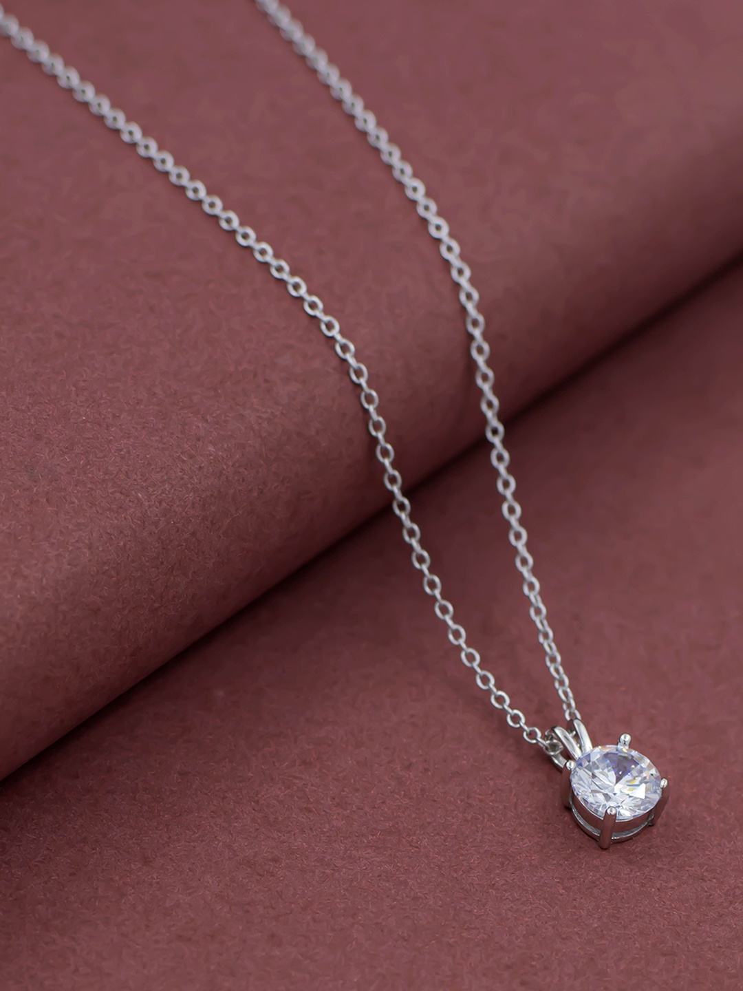 

SILMORA Silver-Plated Stone Studded Oval Pendant with Chain