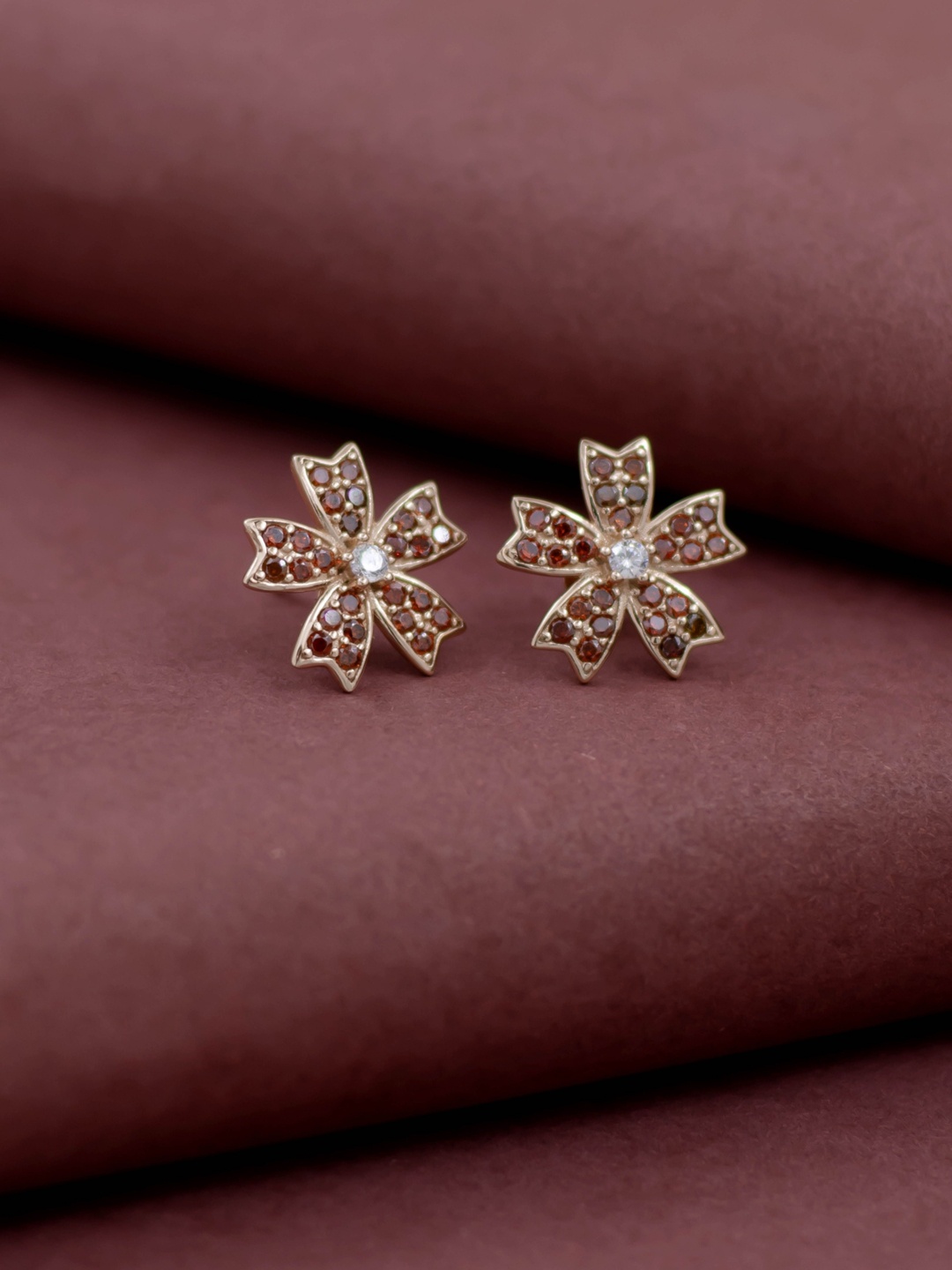 

SILMORA Silver-Plated Artificial Stones Studded Floral Shaped Studs