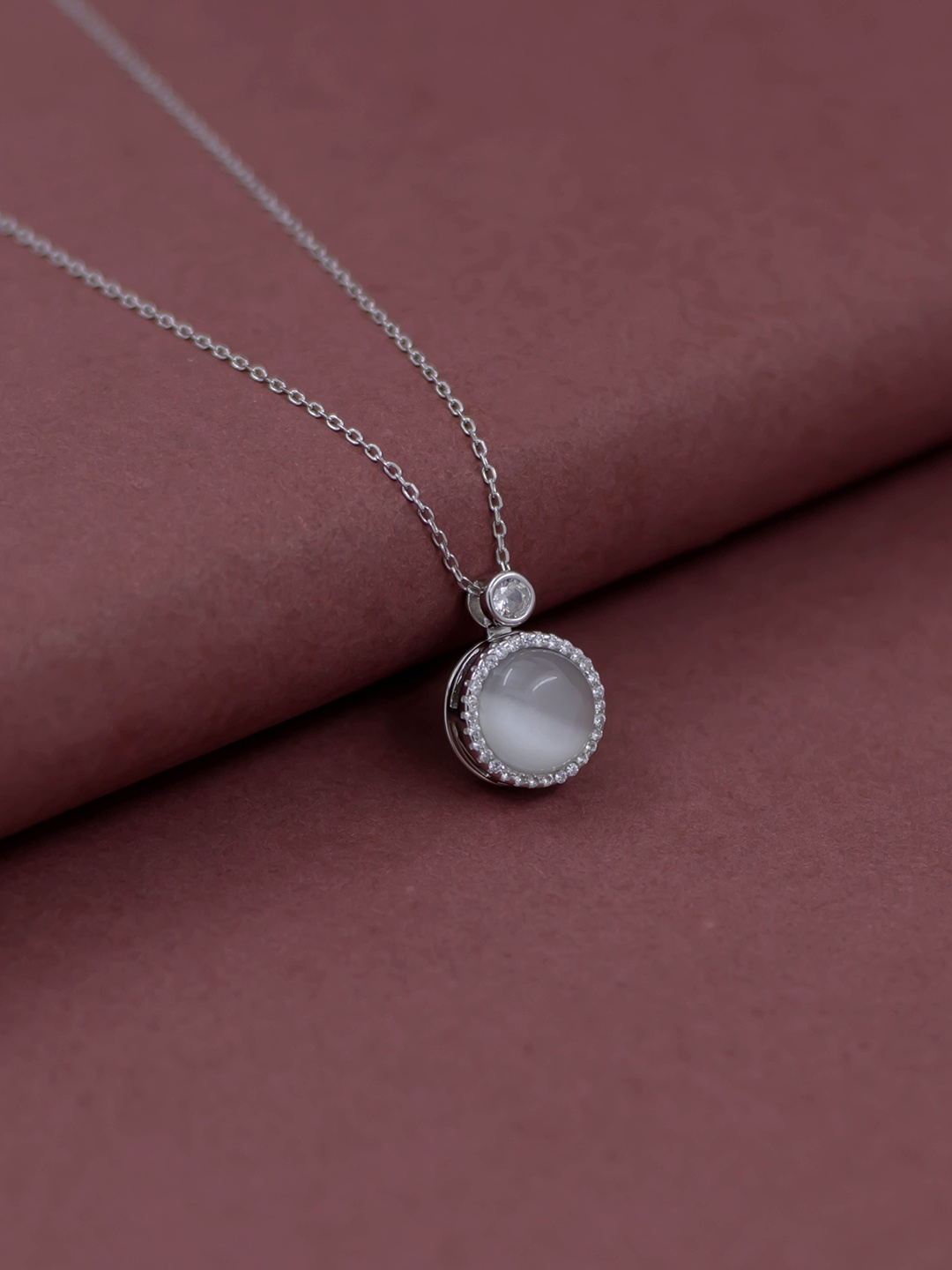 

SILMORA Silver-Plated Stone Studded Circular Pendant with Chain