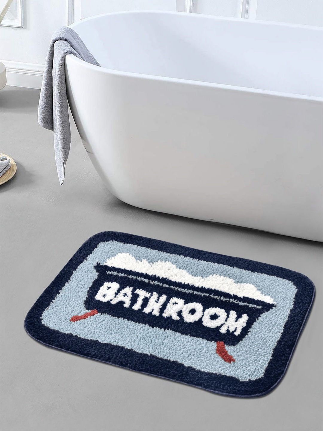 

FABINALIV Blue & White Textured Anti-Skid Bath Mat