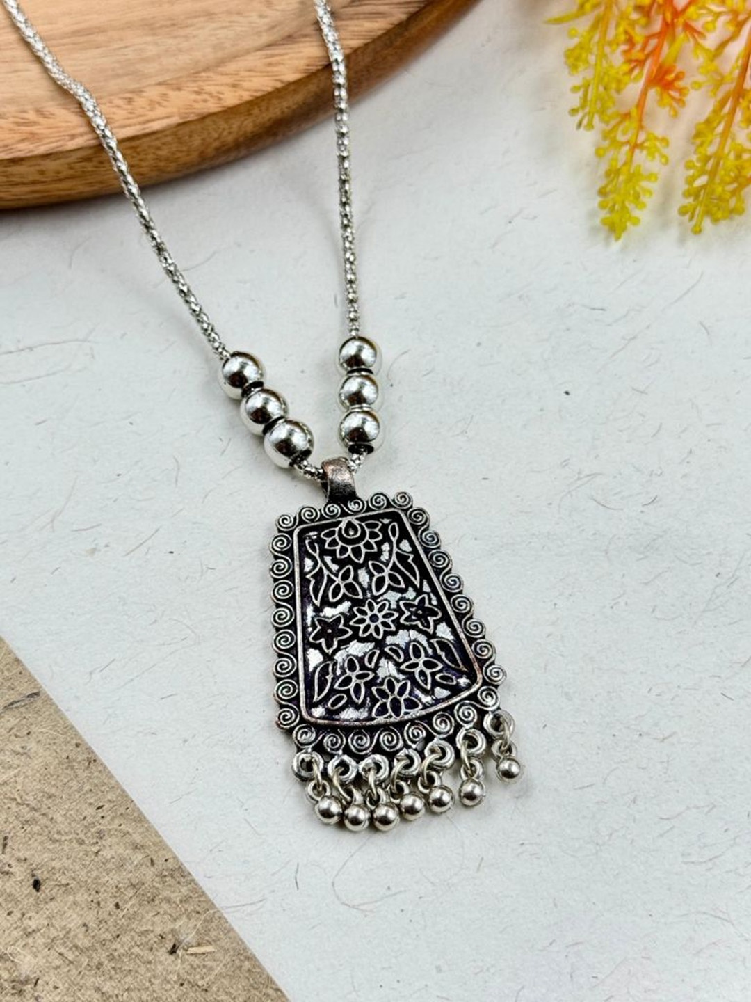 

NAMAN ARTS Silver-Plated Square Oxidised Pendant With Chain