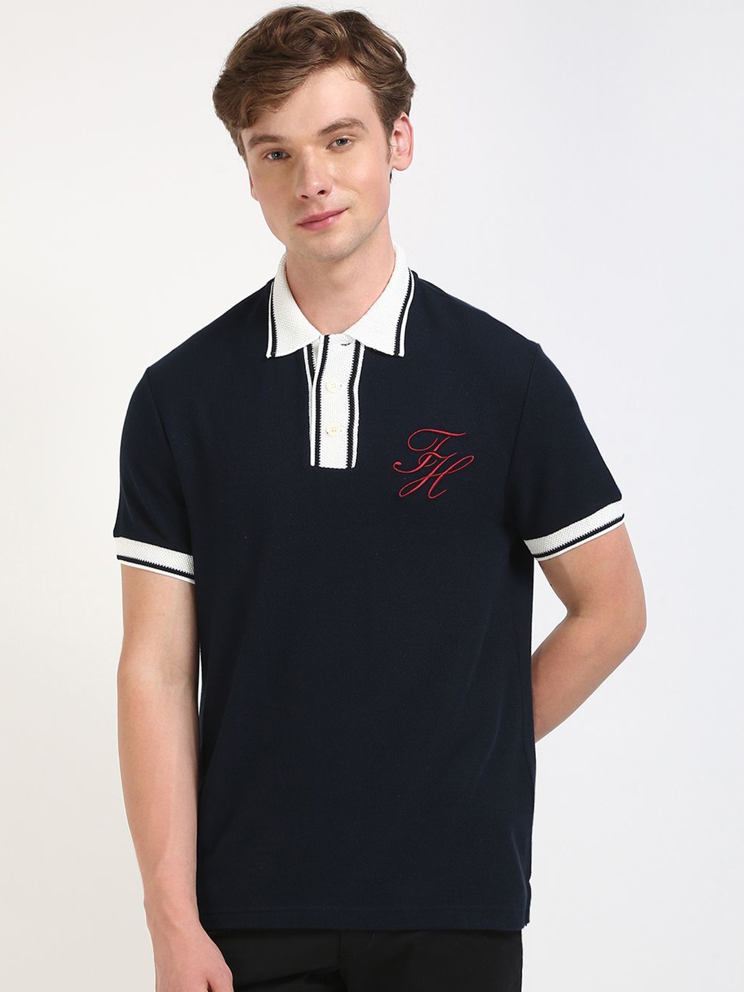 

Tommy Hilfiger Men Solid Polo Collar Cotton T-shirt, Black