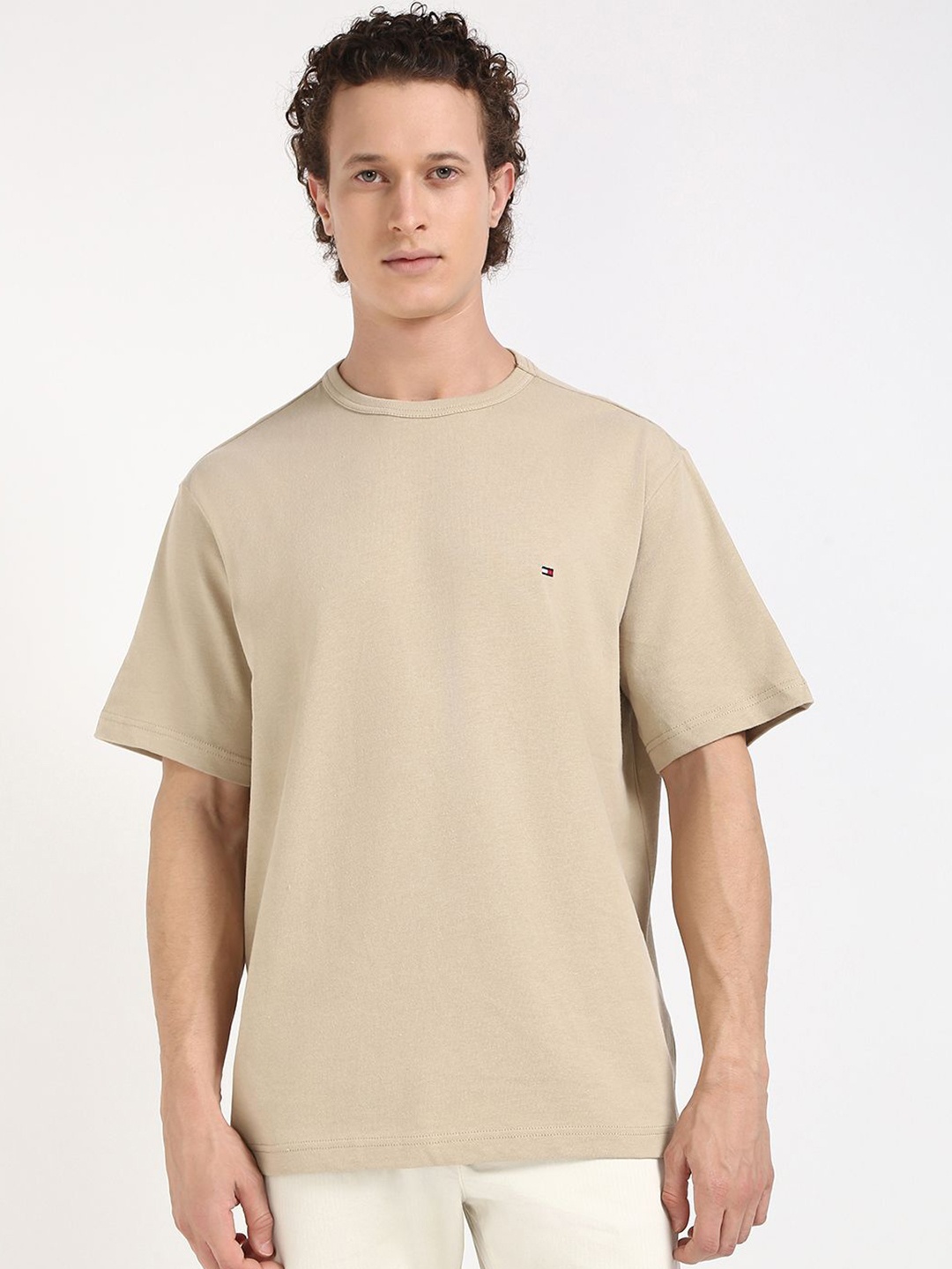 

Tommy Hilfiger Men Solid Round Neck Cotton T-shirt, Beige