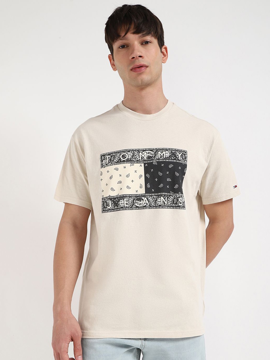 

Tommy Hilfiger Men Graphic Printed Round Neck Cotton T-shirt, Beige