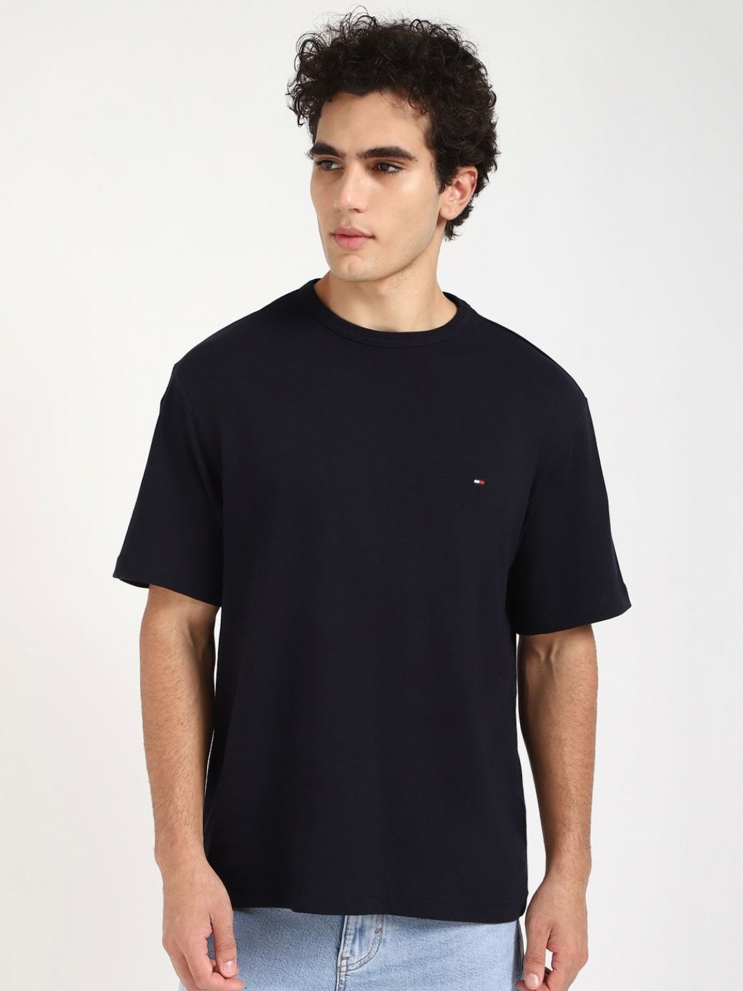 

Tommy Hilfiger Men Solid Round Neck Cotton T-shirt, Black