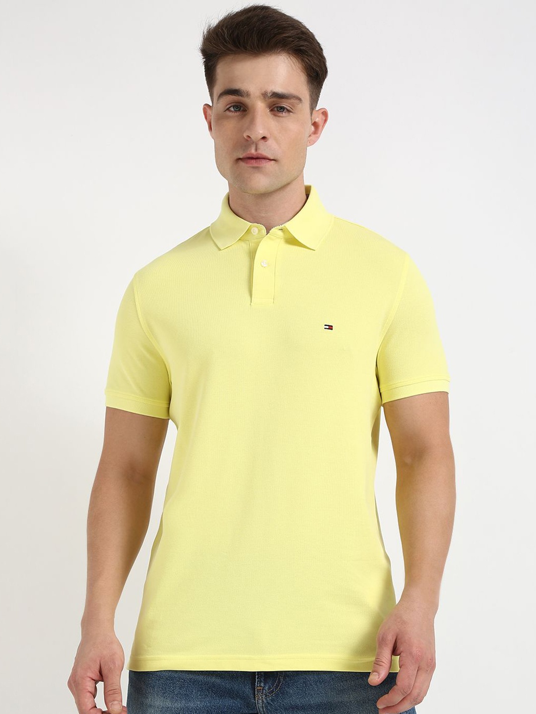 

Tommy Hilfiger Men Solid Polo Collar Cotton T-shirt, Yellow