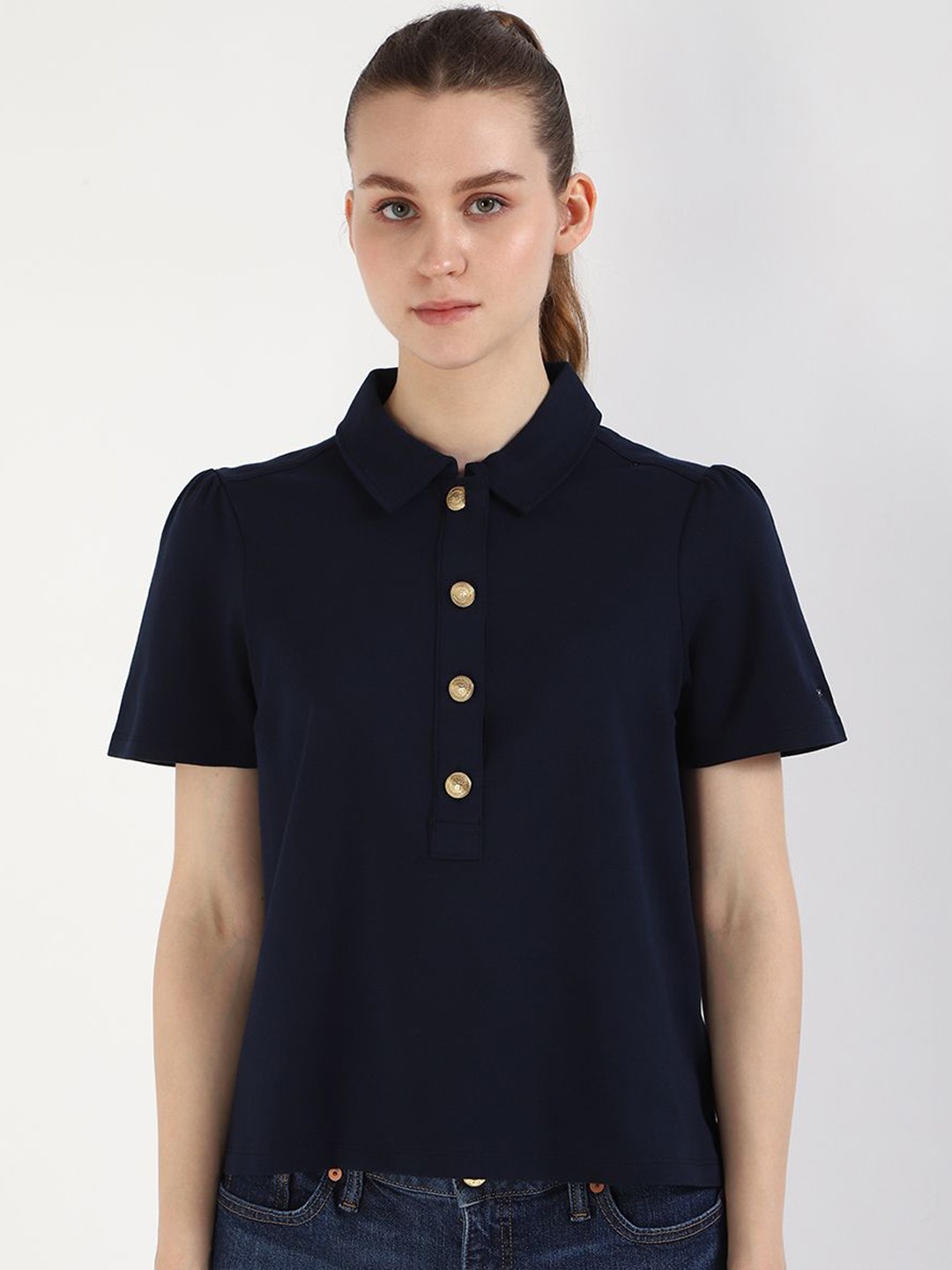 

Tommy Hilfiger Women Solid Polo Collar Cotton T-shirt, Black