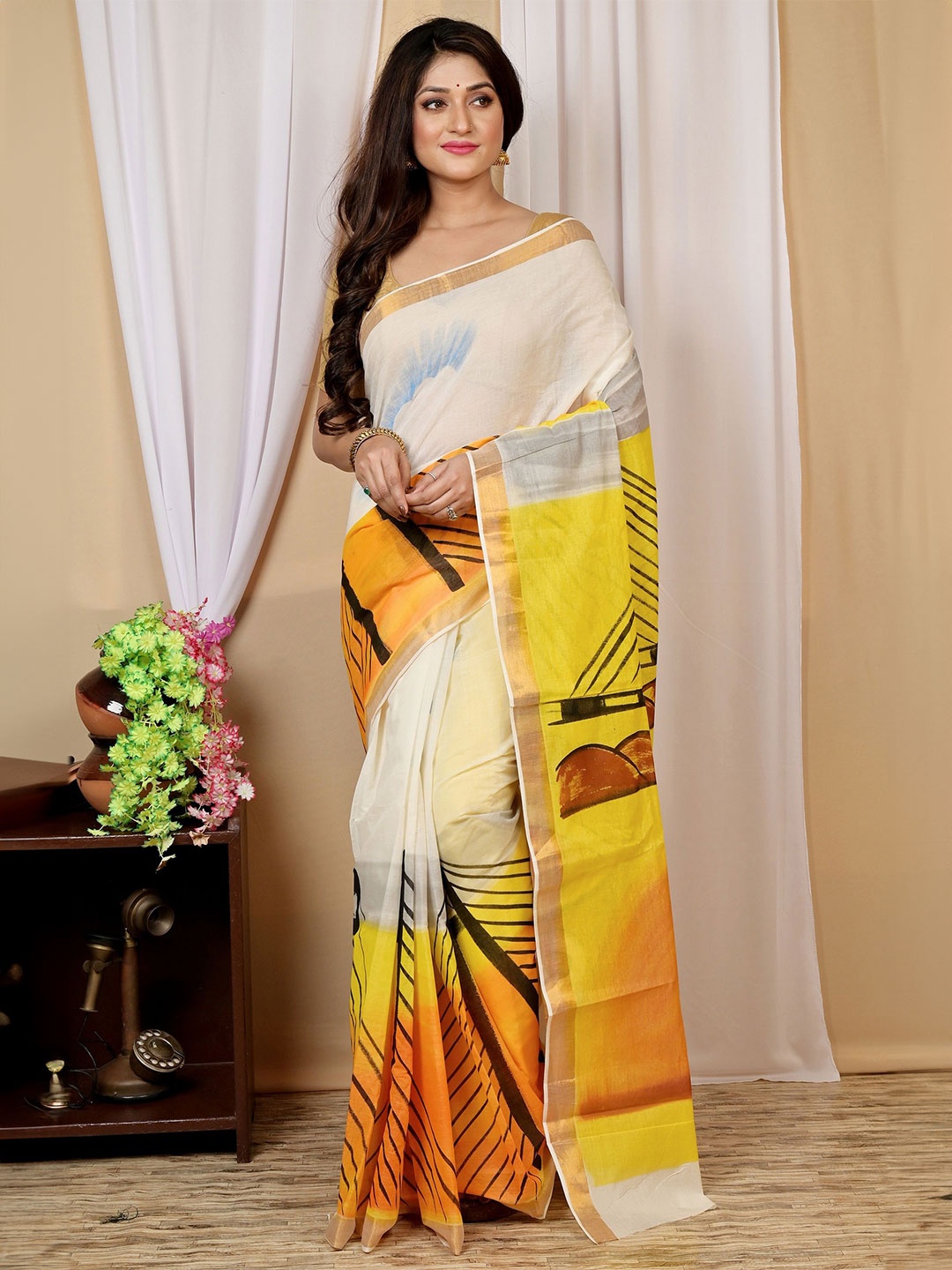 

PuJoy Ethnic Motifs Zari Taant Saree, Yellow