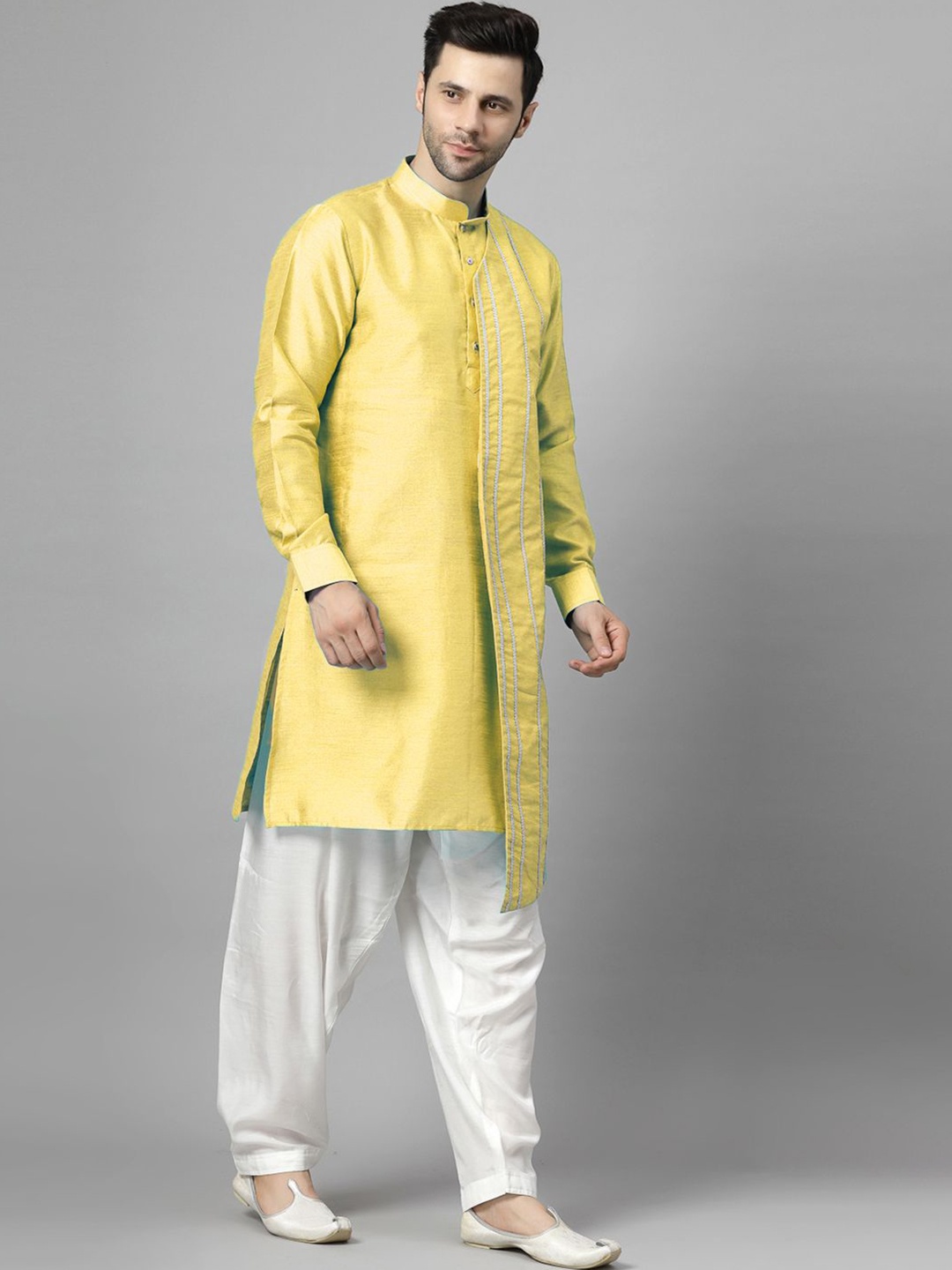 

Utsav Fashion Stand Collar Asymmetric Kurta With Pyjama, Yellow