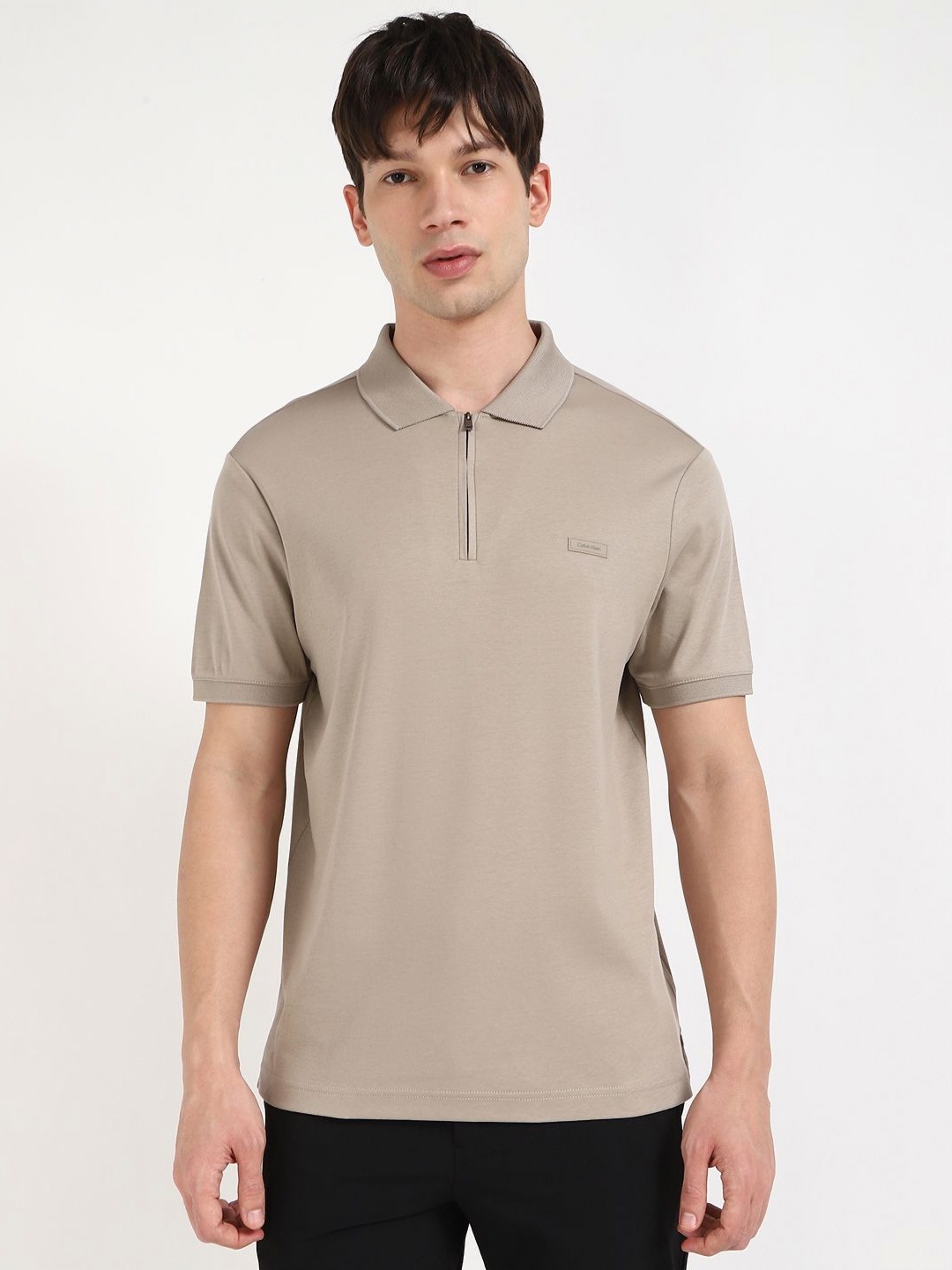 

Calvin Klein Jeans Men Solid Polo Collar Cotton T-shirt, Beige